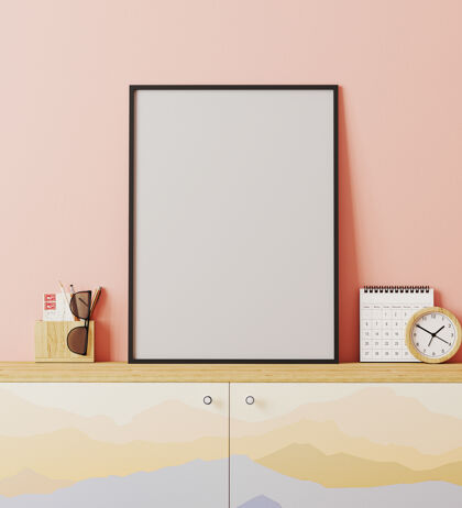室内现代旅行家风格室内的空白海报框架 粉色墙壁 柜子 山体印刷 装饰 旅行概念 3d渲染旅行者山空白
