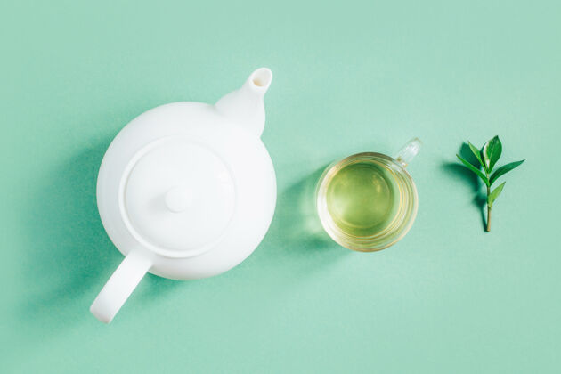 杯子一套茶具的俯视图茶壶糖碗杯茶上的绿色表面盘子茶具茶道