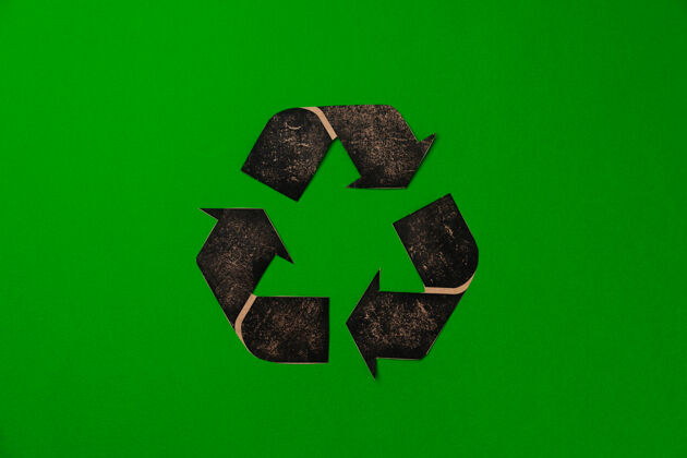 再利用绿色表面上的纸张回收概念俯视图抽象环境环境