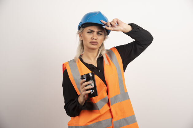 悲伤建筑工人用一杯茶感伤高品质照片女性杯子职业