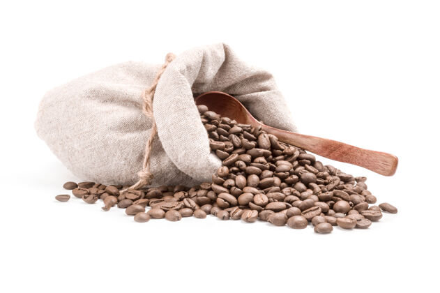 白色咖啡粒被隔离在一个白色的切口上咖啡豆谷物种子