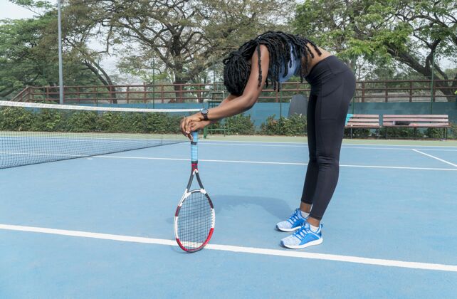 运动打网球的女人网球网球拍体育