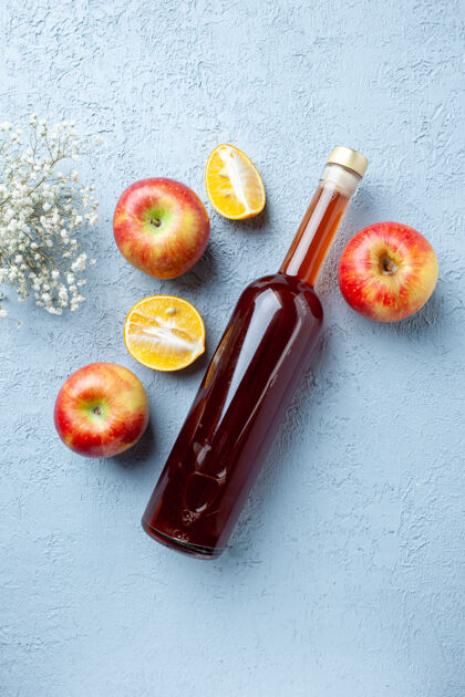 剪辑顶视图苹果醋在白色的桌子上的瓶子果汁水果颜色照片红色新鲜酸的食物果汁水果头发滑梯
