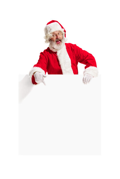 空白惊喜的圣诞老人指着空白广告圣诞节节日男人