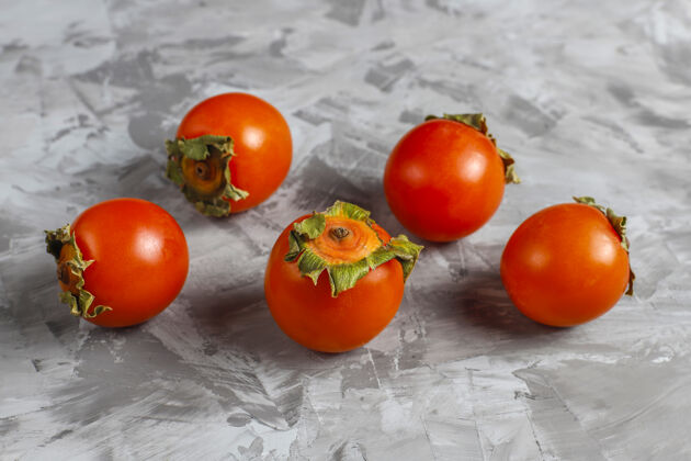 素食者新鲜的有机熟柿子水果有机橘子成熟的