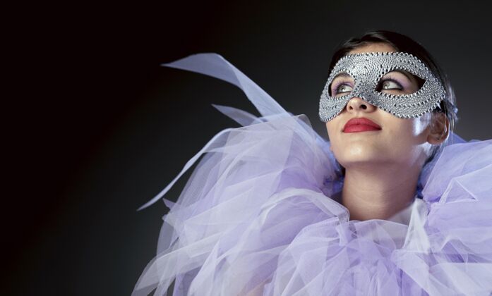 嘉年华面具戴着狂欢节面具的神秘女人神秘女性嘉年华