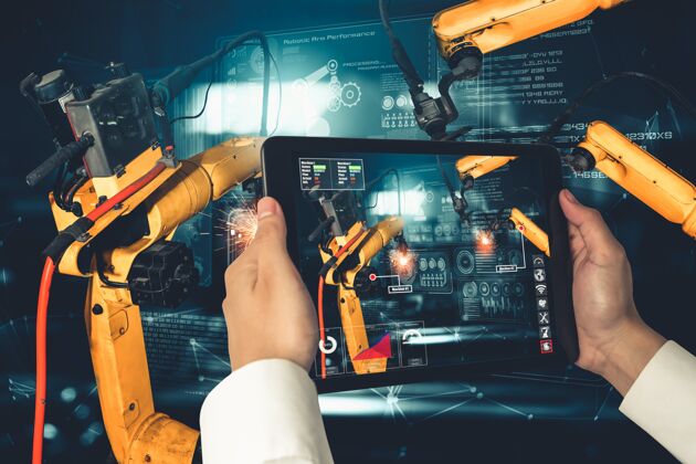 工程师工程师通过增强现实工业技术控制机械臂Arm工人自动化