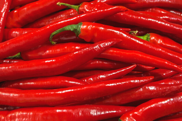 蔬菜蔬菜市场或食品批发店的红辣椒胡椒背景生的胡椒销售