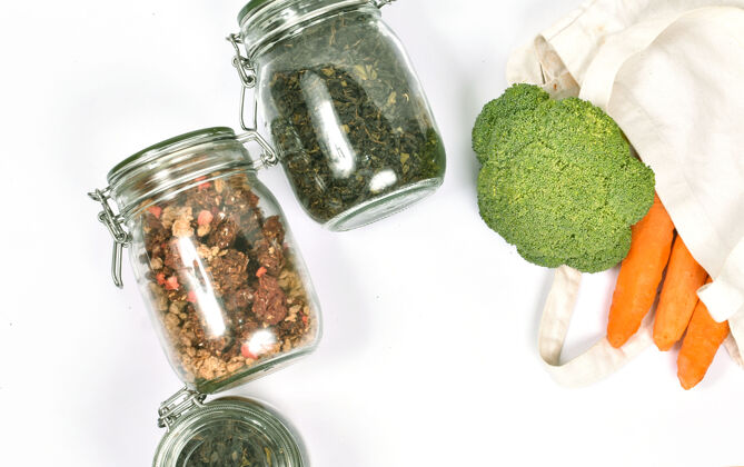 零浪费白色环保米色手提袋中的新鲜蔬菜墙面玻璃绿茶罐格拉诺拉麦片.0废物概念 平淡健康花椰菜衣服