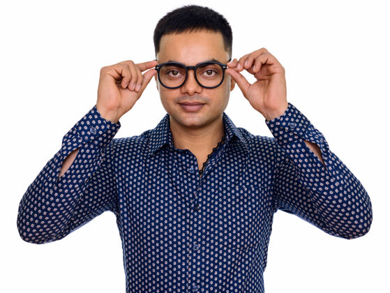眼镜年轻英俊的印度男人 戴着与白色空间隔离的眼镜男男吸引力