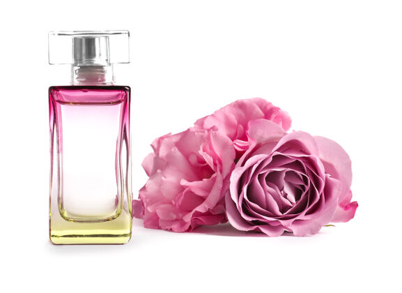 女性一瓶白色表面有花的香水时尚玫瑰优雅