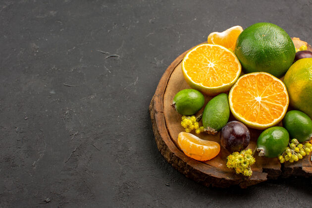 柠檬在黑暗的空间里看到新鲜的绿橘子和飞珠食品节食肥肉