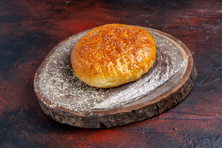 柑橘前视图甜烤面包面包像新鲜面包在黑暗的背景背景饮食面包