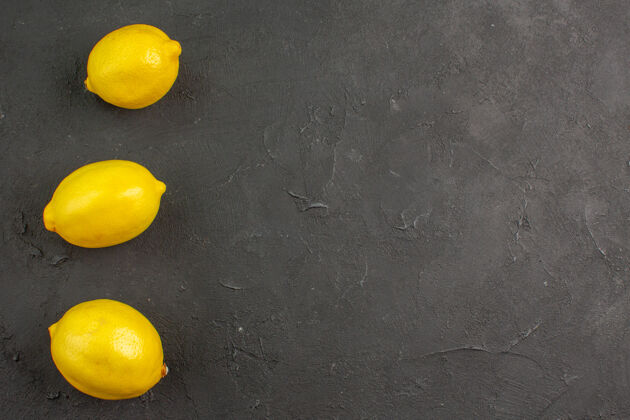 柠檬色顶视图新鲜的酸柠檬 深色的柠檬 柑橘黄色的水果食物柑橘黄色