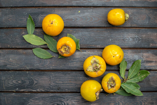 食品顶视图新鲜的柿子放在木质质朴的餐桌上 水果成熟醇厚成熟橘子柑橘