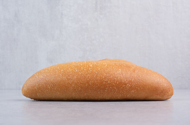 谷类石头背景上的新鲜面包高品质照片面包卷面包小麦
