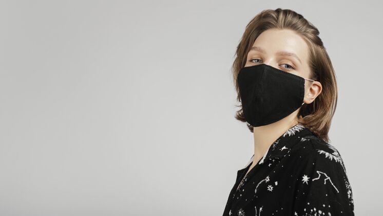 措施戴着面具的女人冠状病毒模特保护
