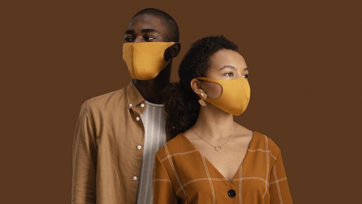夫妇一对戴着面具的情侣的正面图个人女性黑人