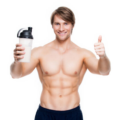 瓶子年轻帅气的健美运动员拿着瓶子在白墙上摆姿势胸部帅哥身体