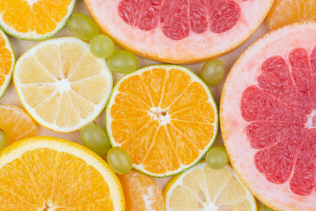 橙子关闭各种柑橘类水果片和葡萄柚子葡萄新鲜