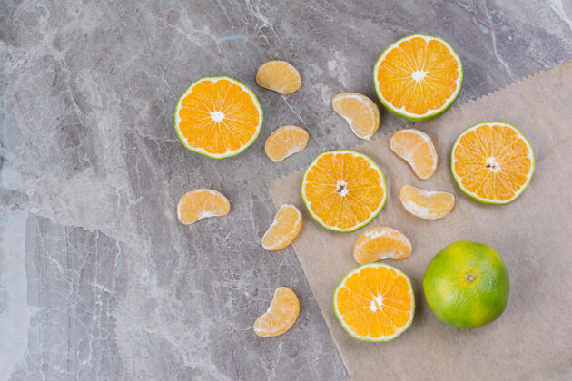 柑橘柑橘类水果散落在石头的背景上柠檬水果天然