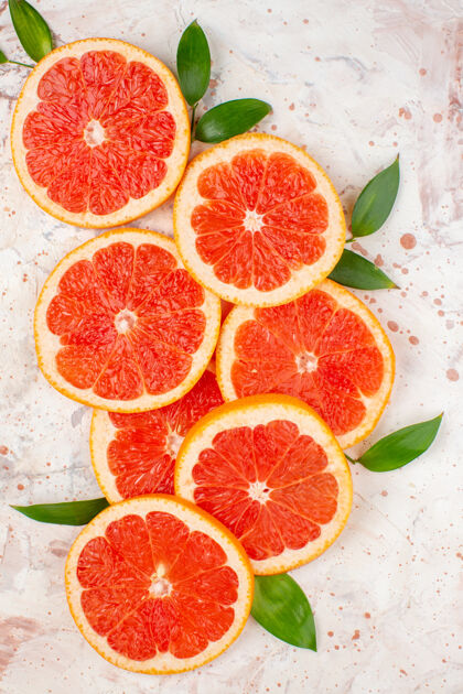 维生素俯瞰美味葡萄柚片柠檬片上裸体水果桌照片葡萄柚片果汁顶部