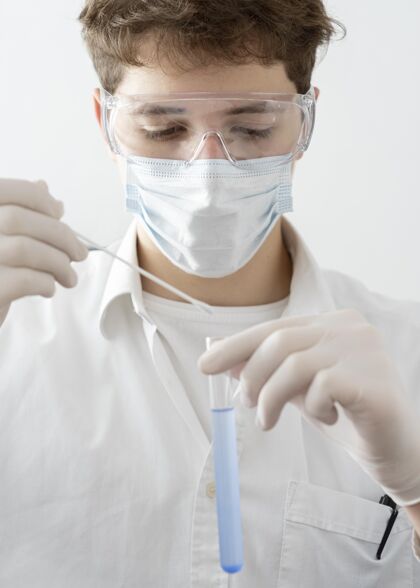 化学特写戴着面具和护目镜的男人技术组成分类