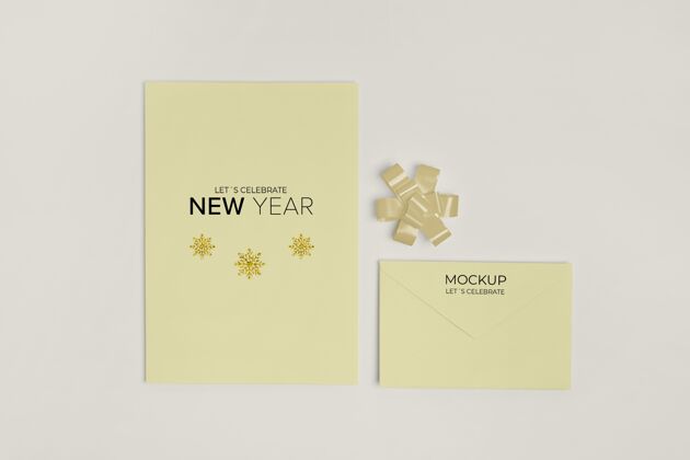 庆祝新年请柬实物模型与丝带顶视图快乐卡片新