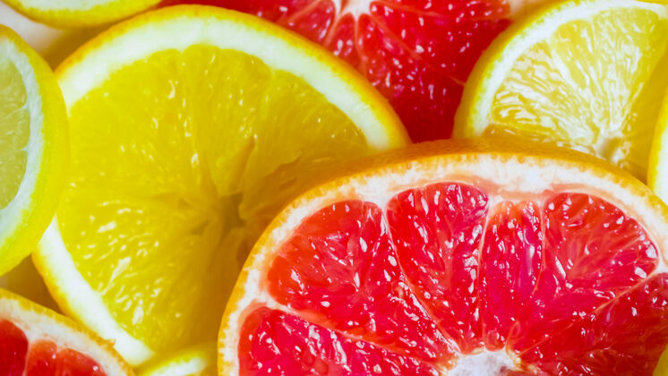 食物成熟的葡萄柚 柠檬 橘子和酸橙片水果饮食健康